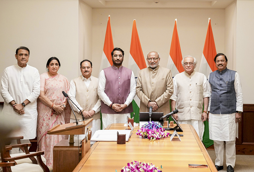 Vice President and Rajya Sabha Chairman CP Radhakrishnan, Union Minister JP Nadda, Congress MP Jairam Ramesh, Maharashtra Deputy Chief Minister Sunetra Pawar and NCP leaders Sunil Tatkare and Praful Patel during the oath ceremony of Parth Pawar, son of late party chief Ajit Pawar, as an elected member of the House, in New Delhi. 