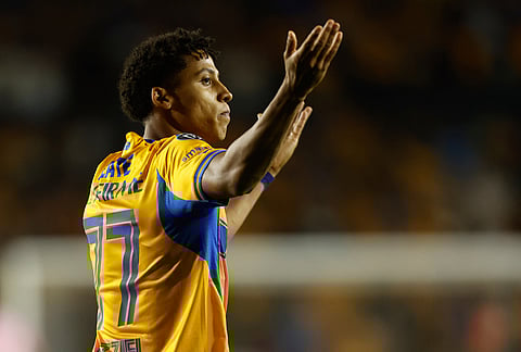 Ozziel Herrera of Mexico's Tigres celebrates scoring his side's opening goal against the United States' Seattle Sounders during a CONCACAF Champions Cup quarterfinal first leg soccer match in Monterrey, Mexico.