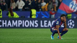 | Photo: AP/Joan Monfort : Barcelona's Lamine Yamal reacts disappointed after the Champions League quarterfinal first leg soccer match between Barcelona and Atletico Madrid in Barcelona, Spain, Wednesday, April 8, 2026.