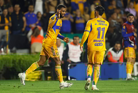 Mexico's Tigres players celebrate after Jackson Ragen of the United States' Seattle Sounders scoring an own goal during a CONCACAF Champions Cup quarterfinal first leg soccer match in Monterrey, Mexico.