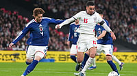 | Photo: AP/Kirsty Wigglesworth : Japan's Ayumu Seko, left, and England's Morgan Rogers challenge for the ball during the International friendly soccer match between England and Japan in London, Tuesday, March 31, 2026 . 