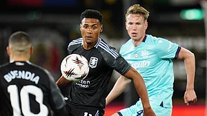 Massimo Paolone/LaPresse : Aston Villa's Ollie Watkins and Bologna's Torbjorn Heggem, right, in action during the Europa League soccer match.