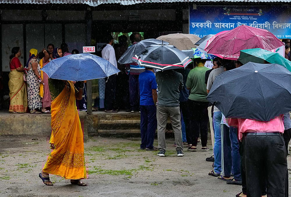 Assembly elections voting-People stand in queue in guwahati