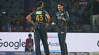 IPL 2026: Shubman Gill Fined INR 12 Lakh For Slow Over-Rate After GT’s Thriller Win Over DC | Photo: AP/Manish Swarup : Gujarat Titans' captain Shubman Gill, right, talks to his team bowler Prasidh Krishna during the Indian Premier League cricket match between Delhi Capitals and Gujarat Titans in New Delhi.