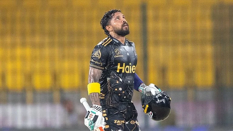 Kusal Mendis celebrating his century for Peshawar Zalmi against Karachi Kings in IPL 2026 clash at National Stadium in Karachi. - thepslt20/X