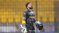 thepslt20/X : Kusal Mendis celebrating his century for Peshawar Zalmi against Karachi Kings in IPL 2026 clash at National Stadium in Karachi. 