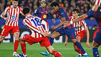 | Photo: AP/Joan Monfort : Barcelona's Lamine Yamal challenges for the ball with Atletico Madrid's Marc Pubill during the Champions League quarterfinal first leg soccer match between Barcelona and Atletico Madrid in Barcelona, Spain, Wednesday, April 8, 2026. 