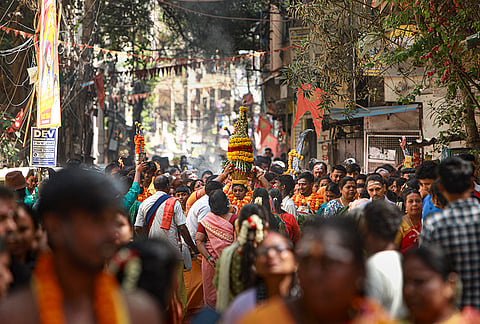 People from the Tamil community take part in an event marking the 'Mariamman Annual Festival', in New Delhi. The festival is celebrated to honor the goddess of rain and fertility. 