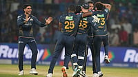 | Photo: AP/Manish Swarup : Gujarat Titans' captain Shubman Gill, left, along with his teammates celebrates after they won the Indian Premier League cricket match against Delhi Capitals in New Delhi.