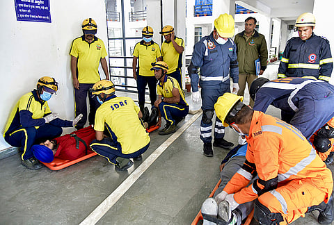 NDRF, SDRF and Fire Brigade personnel participate in a mock drill organised by the National Disaster Management Authority (NDMA) ahead of the 'Char Dham Yatra', in Rishikesh, Uttarakhand.