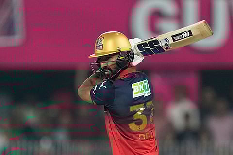Royal Challengers Bengaluru's Devdutt Padikkal plays a shot during the Indian Premier League cricket match between Royal Challengers Bengaluru and Rajasthan Royals in Guwahati, India.