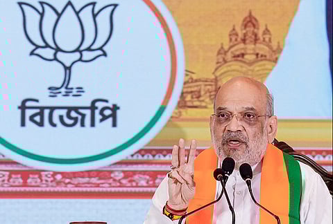 Union Home Minister Amit Shah addresses a press conference during the unveiling of 'BJP Sankalp Patra', the party's manifesto for the upcoming West Bengal Assembly elections, in Kolkata.