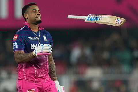 Rajasthan Royals' Shimron Hetmyer shows his bat in air after his dismissal during the Indian Premier League cricket match between Royal Challengers Bengaluru and Rajasthan Royals in Guwahati, India.
