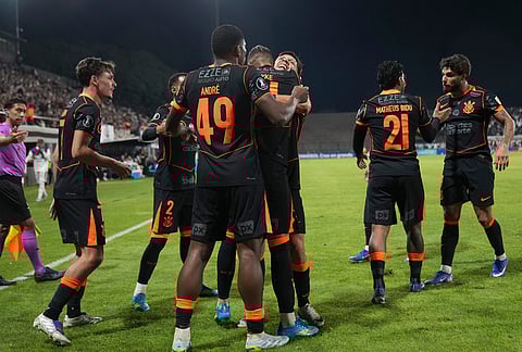 Kayke Ferrari of Brazil's Corinthians, center, celebrates with teammates after scoring his side's opening goal against Argentina's Platense during a Copa Libertadores Group E soccer match in Buenos Aires, Argentina.