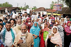 | Photo: Sandipan Chatterjee : A Wave of Deletions: Voters deleted from the rolls showing their documents at Daulatpur grampanchayat, Milangarh, Malda in West Bengal
