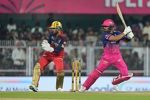 Rajasthan Royals' Dhruv Jurel hits a boundary during the Indian Premier League cricket match between Royal Challengers Bengaluru and Rajasthan Royals in Guwahati, India.
