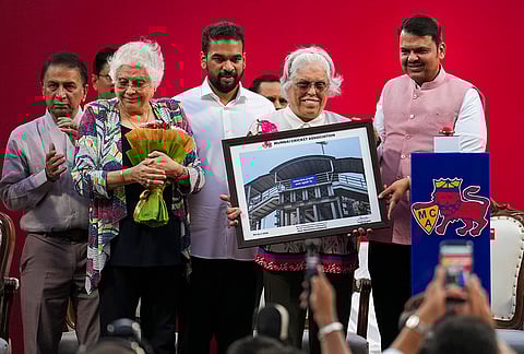 Maharashtra Chief Minister Devendra Fadnavis, right, with former cricketer Diana Edulji, second right, during the unveiling event of the Ravi Shastri Stand and dedication of stadium gates in the names of former cricketers Dilip Sardesai, Eknath Solkar, and Diana Edulji organised by MCA, at Wankhede Stadium in Mumbai.