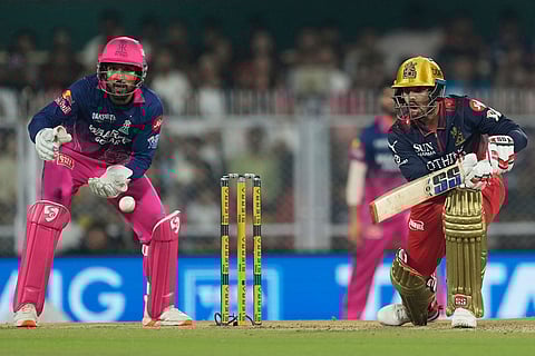 Royal Challengers Bengaluru's captain Rajat Patidar plays a shot during the Indian Premier League cricket match between Royal Challengers Bengaluru and Rajasthan Royals in Guwahati, India.