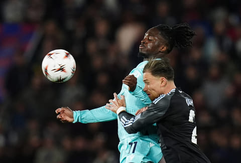 Bologna's Jonathan Rowe, left, and Aston Villa's Matty Cash in action during the Europa League soccer match between Bologna and Aston Villa in Bologna, Italy.