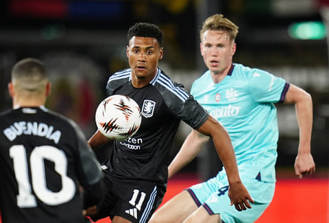 Aston Villa's Ollie Watkins and Bologna's Torbjorn Heggem, right, in action during the Europa League soccer match between Bologna and Aston Villa in Bologna, Italy.