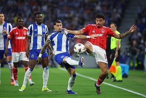 Nottingham Forest's Morgan Gibbs-White, right, fights for the ball with Porto's Borja Sainz during the Europa League quarterfinals, first leg, soccer match between FC Porto and Nottingham Forest in Porto, Portugal.
