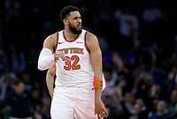 New York Knicks Vs Boston Celtics, NBA 2026: Knicks Hold Nerve Late To Sink Celtics 112–106 | Photo: AP/John Munson : New York Knicks center Karl-Anthony Towns reacts after making a 3-point basket during the second half of an NBA basketball game against the Boston Celtics in New York.