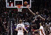 Toronto Raptors Vs Miami Heat, NBA 2026: Ingram’s Season-High 38 Ignites Raptors' Playoff Push - In Pics | Photo: Nathan Denette/The Canadian Press via AP : Toronto Raptors' Brandon Ingram (3) scores as Miami Heat's Kasparas Jakucionis (25) and Norman Powell (24) look on during the second half of an NBA basketball game in Toronto.