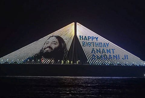 An illuminated view of the Bandra-Worli Sea Link on the eve of Reliance Industries Chairman Mukesh Ambani's son Anant Ambani’s birthday, in Mumbai.