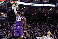 | Photo: Carlos Avila Gonzalez/San Francisco Chronicle via AP : LeBron James (23) dunks in the second half as the Golden State Warriors played the Los Angeles Lakers at Chase Center in San Francisco.