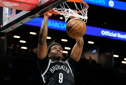 Brooklyn Nets forward E.J. Liddell dunks during the second half of an NBA basketball game against Indiana Pacers, in New York.