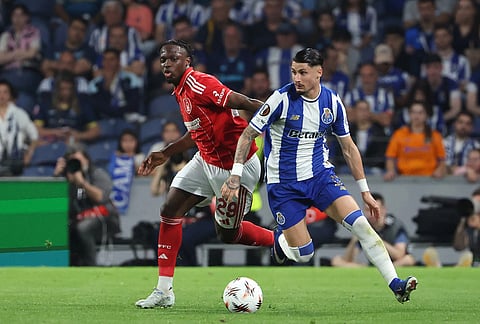 Porto's Borja Sainz, right, controls the ball next to Nottingham Forest's Dilane Bakwa during the Europa League quarterfinals, first leg, soccer match between FC Porto and Nottingham Forest in Porto, Portugal.
