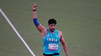 | Photo: AP/Louise Delmotte : World Athletics Championships Men's Javelin Final