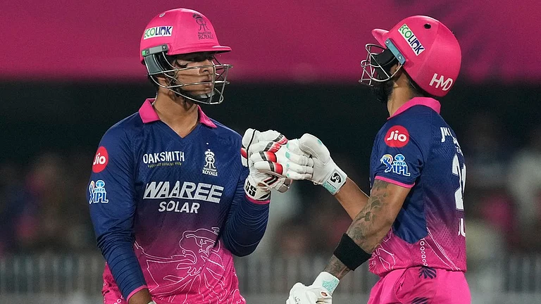 Rajasthan Royals' Vaibhav Sooryavanshi, left and Rajasthan Royals' Dhruv Jurel toss during the Indian Premier League cricket match between Royal Challengers Bengaluru and Rajasthan Royals in Guwahati, India, Friday, April 10, 2026. - AP Photo/Anupam Nath