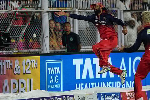 Royal Challengers Bengaluru's Krunal Pandya drops a catch from Rajasthan Royals' Vaibhav Sooryavanshi during the Indian Premier League cricket match between Royal Challengers Bengaluru and Rajasthan Royals in Guwahati, India.