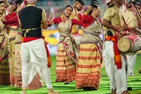 Artists performing Bihu dance prior to start of the Indian Premier League cricket match between Royal Challengers Bengaluru and Rajasthan Royals in Guwahati, India.