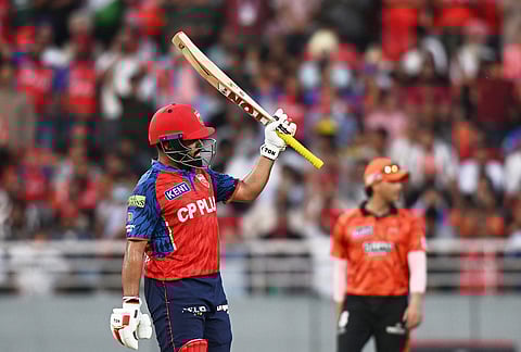 Punjab Kings' Prabhsimran Singh celebrates his fifty runs during the Indian Premier League cricket match between Punjab Kings and Sunrisers Hyderabad in New Chandigarh.