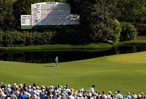 Rory McIlroy, of Northern Ireland, walks to green on the 11th hole during the second round of the Masters golf tournament at the Augusta National Golf Club in Augusta, Georgia. 