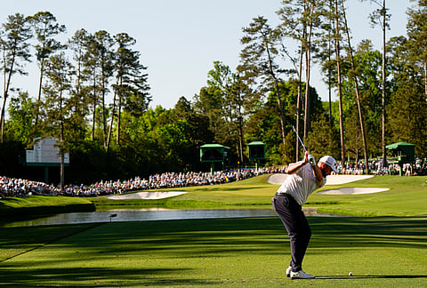 Shane Lowry, of Ireland, hits his tee shot on the 16th hole during the second round of the Masters golf tournament at the Augusta National Golf Club, 
in Augusta, Georgia. 