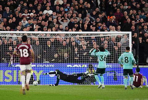 West Ham United's Taty Castellanos scores their side's second goal of the game during their English Premier League soccer match against Wolverhampton Wanderers in London.