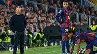 | Photo: AP/Joan Monfort : Barcelona's head coach Hansi Flick, left, Barcelona's Jules Kounde, Barcelona's Lamine Yamal during the Champions League quarterfinal first leg soccer match between Barcelona and Atletico Madrid in Barcelona, Spain, Wednesday, April 8, 2026.