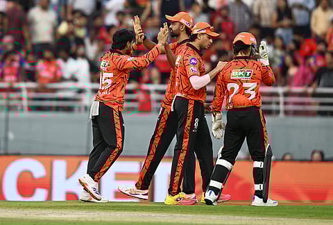 Sunrisers Hyderabad's Shivang Kumar, left, celebrates with teammates the dismissal of Punjab Kings' Priyansh Arya during the Indian Premier League cricket match between Punjab Kings and Sunrisers Hyderabad in New Chandigarh.