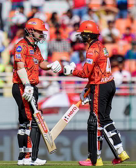 Sunrisers Hyderabad's Abhishek Sharma, right, and Travis Head during the Indian Premier League (IPL) 2026 cricket match between Punjab Kings and Sunrisers Hyderabad, at MYS Cricket Stadium in New Chandigarh.