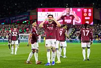 | Photo: Jordan Pettitt/PA via AP : West Ham United's Konstantinos Mavropanos celebrates scoring their side's fourth goal of the game during their English Premier League soccer match against Wolverhampton Wanderers in London.
