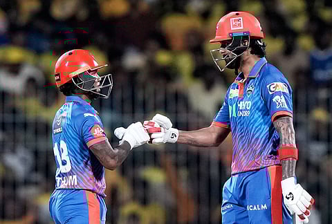 Delhi Capitals' Pathum Nissanka, left, and KL Rahul toss during the Indian Premier League cricket match between Chennai Super Kings and Delhi Capitals in Chennai.