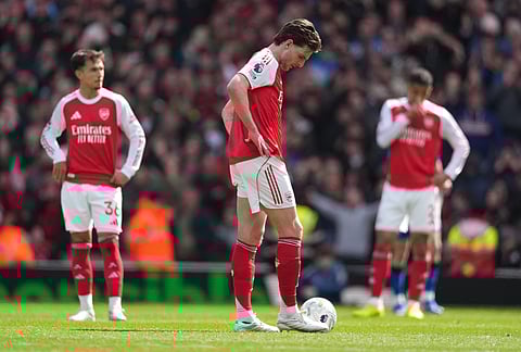 Arsenal's Declan Rice stands dejeted after conceding a goal during the Premier League soccer match between Arsenal and Bournemouth in London, England.