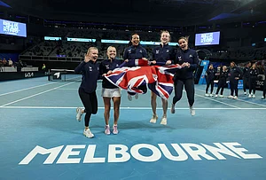 | Photo: Con Chronis/AAP Image via AP : British Billy Jean Cup tennis players Harriet Dart, Katie Swan, Anne Keothavong, Mika Stojsavljevic and Jodie Anna Burrage celebrate, Saturday, April 11, 2026, after defeating Australia in Melbourne.