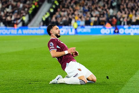 West Ham United's Taty Castellanos celebrates scoring their side's third goal of the game during their English Premier League soccer match against Wolverhampton Wanderers in London.