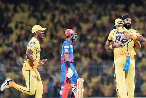 Chennai Super Kings' Gurjapneet Singh celebrates with teammates the wicket of Delhi Capitals' captain Axar Patel during the Indian Premier League cricket match between Chennai Super Kings and Delhi Capitals in Chennai.