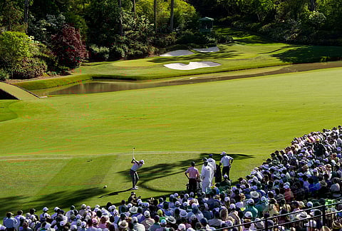Rory McIlroy, of Northern Ireland, hits his tee shot on the 12th hole during the second round of the Masters golf tournament at the Augusta National Golf Club in Augusta, Georgia. 