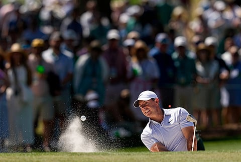 Rory McIlroy, of Northern Ireland, hits from the bunker on the seventh hole during the second round of the Masters golf tournament at the Augusta National Golf Club, in Augusta, Georgia. 